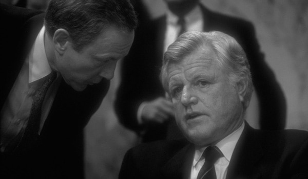 Senators Orrin Hatch (R-UT) confers with Ted Kennedy (D-MA)