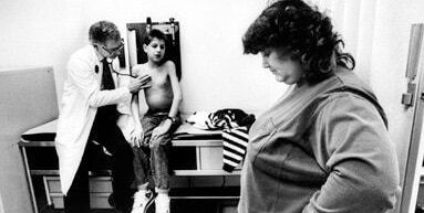 Ryan White’s physician listens to his lungs