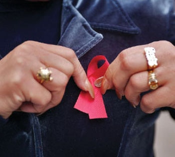 The red ribbon was the creation of the Visual AIDS Artists Caucus in New York, which was searching for a visual symbol to show compassion for people living with AIDS and their caregivers. First worn publicly at the Tony Awards in 1991, it continues to be a powerful force in the fight to increase public awareness of HIV/AIDS and to increase funding for AIDS services and research.